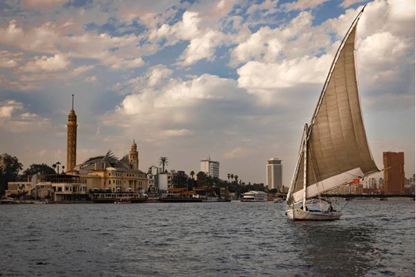 Peaceful sunset felucca sailing on the Nile
